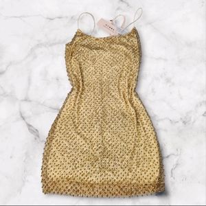 New w Tags Oh Polly Mini dress in Gold